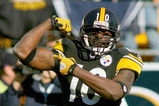 PITTSBURGH - OCTOBER 25: Santonio Holmes #10 of the Pittsburgh Steelers celebrates a play against the Minnesota Vikings  at Heinz Field on October 25, 2009 in Pittsburgh, Pennsylvania.Pittsburgh won 27-17. (Photo by Rick Stewart/Getty Images)
