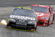 MARTINSVILLE, VA - OCTOBER 25: Jeff Gordon, driver of the #24 DuPont/NationalGuard.com Chevrolet, races Juan Pablo Montoya, driver of the #42 Target Chevrolet, during the NASCAR Sprint Cup Series TUMS Fast Relief 500 at Martinsville Speedway on October 25, 2009 in Martinsville, Virginia. (Photo by John Harrelson/Getty Images)