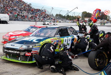 MARTINSVILLE, VA - OCTOBER 25: Carl Edwards, driver of the #99 Aflac Ford, pits during the NASCAR Sprint Cup Series TUMS Fast Relief 500 at Martinsville Speedway on October 25, 2009 in Martinsville, Virginia.  (Photo by Geoff Burke/Getty Images for NASCAR)
