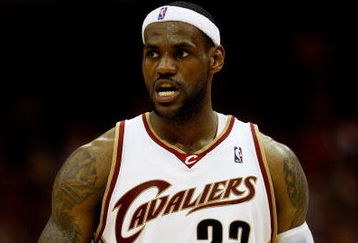 CLEVELAND - MAY 28:  LeBron James #23 of the Cleveland Cavaliers looks on between plays against the Orlando Magic in Game Five of the Eastern Conference Finals during the 2009 Playoffs at Quicken Loans Arena on May 28, 2009 in Cleveland, Ohio. NOTE TO USER: User expressly acknowledges and agrees that, by downloading and or using this photograph, User is consenting to the terms and conditions of the Getty Images License Agreement  (Photo by Gregory Shamus/Getty Images)