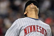 NEW YORK - OCTOBER 09:  Orlando Cabrera #18 of the Minnesota Twins reacts after a long fly ball against the New York Yankees in Game Two of the ALDS during the 2009 MLB Playoffs at Yankee Stadium on October 9, 2009 in the Bronx borough of New York City.  (Photo by Nick Laham/Getty Images)