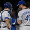 NEW YORK - SEPTEMBER 29: Kyle Farnsworth #40 and John Buck #14 of the Kansas City Royals talk at the mound in the 9th inning during the game against the New York Yankees on September 29, 2009 at Yankee Stadium in the Bronx borough of New York City. (Photo by Jared Wickerham/Getty Images)