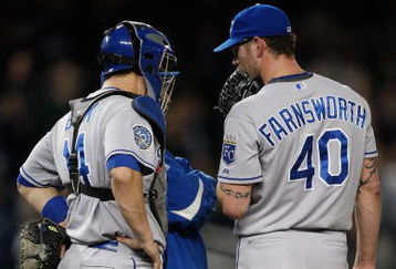 NEW YORK - SEPTEMBER 29: Kyle Farnsworth #40 and John Buck #14 of the Kansas City Royals talk at the mound in the 9th inning during the game against the New York Yankees on September 29, 2009 at Yankee Stadium in the Bronx borough of New York City. (Photo by Jared Wickerham/Getty Images)