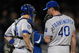 NEW YORK - SEPTEMBER 29: Kyle Farnsworth #40 and John Buck #14 of the Kansas City Royals talk at the mound in the 9th inning during the game against the New York Yankees on September 29, 2009 at Yankee Stadium in the Bronx borough of New York City. (Photo by Jared Wickerham/Getty Images)