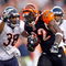 CINCINNATI - OCTOBER 25:  Cedric Benson #32 of the Cincinnati Bengals runs with the ball while defended by Danieal Manning #38 of the Chicago Bears during the NFL game at Paul Brown Stadium on October 25, 2009 in Cincinnati, Ohio.  The Bengals won 45-10.  (Photo by Andy Lyons/Getty Images)