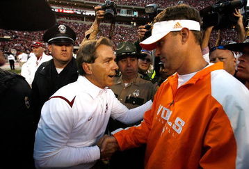 TUSCALOOSA, AL - OCTOBER 24:  Head coach Nick Saban (L) of the Alabama Crimson Tide shakes hands with head coach Lane Kiffin (R) of the Tennessee Volunteers after the Crimson Tide's 12-10 win at Bryant-Denny Stadium on October 24, 2009 in Tuscaloosa, Alabama.  (Photo by Kevin C. Cox/Getty Images)