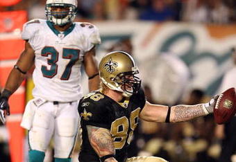 MIAMI - OCTOBER 25:  Tight end Jeremy Shockey #88 of the New Orleans Saints celebrates after making a first down reception over safety Yeremiah Bell #37 of the Miami Dolphins at Land Shark Stadium on October 25, 2009 in Miami, Florida. The Saints defeated the Dolphins 46-34.  (Photo by Doug Benc/Getty Images)