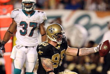 MIAMI - OCTOBER 25:  Tight end Jeremy Shockey #88 of the New Orleans Saints celebrates after making a first down reception over safety Yeremiah Bell #37 of the Miami Dolphins at Land Shark Stadium on October 25, 2009 in Miami, Florida. The Saints defeated the Dolphins 46-34.  (Photo by Doug Benc/Getty Images)
