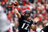 CINCINNATI - OCTOBER 24:  Zach Collaros #12 of the Cincinnati Bearcats throws the ball during the Big East Conference game against the Louisville Cardinals at Nippert Stadium on October 24, 2009 in Cincinnati, Ohio.  (Photo by Andy Lyons/Getty Images)