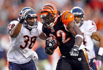 CINCINNATI - OCTOBER 25:  Cedric Benson #32 of the Cincinnati Bengals runs with the ball while defended by Danieal Manning #38 of the Chicago Bears during the NFL game at Paul Brown Stadium on October 25, 2009 in Cincinnati, Ohio.  The Bengals won 45-10.  (Photo by Andy Lyons/Getty Images)