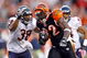 CINCINNATI - OCTOBER 25:  Cedric Benson #32 of the Cincinnati Bengals runs with the ball while defended by Danieal Manning #38 of the Chicago Bears during the NFL game at Paul Brown Stadium on October 25, 2009 in Cincinnati, Ohio.  The Bengals won 45-10.  (Photo by Andy Lyons/Getty Images)