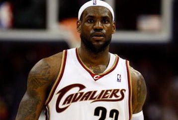 CLEVELAND - MAY 28:  LeBron James #23 of the Cleveland Cavaliers looks on between plays against the Orlando Magic in Game Five of the Eastern Conference Finals during the 2009 Playoffs at Quicken Loans Arena on May 28, 2009 in Cleveland, Ohio. NOTE TO USER: User expressly acknowledges and agrees that, by downloading and or using this photograph, User is consenting to the terms and conditions of the Getty Images License Agreement  (Photo by Gregory Shamus/Getty Images)
