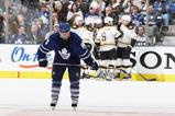 TORONTO - MARCH 28:  Jason Blake #55 of the Toronto Maple Leafs hangs his head as members of the Boston Bruins celebrate a 2nd period goal during their NHL game at the Air Canada Centre March 28, 2009 in Toronto, Ontario.(Photo By Dave Sandford/Getty Images)