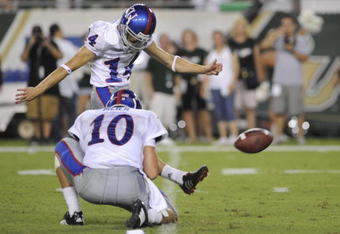 TAMPA, FL - SEPTEMBER 12: Kicker Jacob Branstetter #14 of the Kansas University Jayhawks attempts a field goal against the University of South Florida Bulls at Raymond James Stadium on September 12, 2008 in Tampa, Florida.  (Photo by Al Messerschmidt/Getty Images) 
