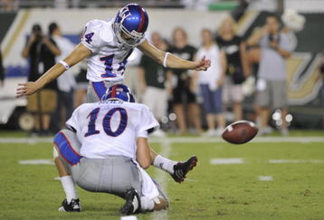 TAMPA, FL - SEPTEMBER 12: Kicker Jacob Branstetter #14 of the Kansas University Jayhawks attempts a field goal against the University of South Florida Bulls at Raymond James Stadium on September 12, 2008 in Tampa, Florida.  (Photo by Al Messerschmidt/Getty Images) 