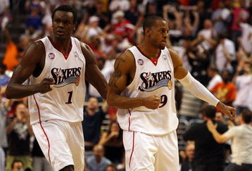 PHILADELPHIA - APRIL 26:  Andre Iguodala #9 and Samuel Dalembert #1 of the Philadelphia 76ers react after a basket against the Orlando Magic during Game Four of the Eastern Conference Quarterfinals during the 2009 NBA Playoffs at the Wachovia Center on April 26, 2009 in Philadelphia, Pennsylvania. Orlando defeated Philadelphia 84-81 to even the series at 2 games each. NOTE TO USER: User expressly acknowledges and agrees that, by downloading and/or using this Photograph, user is consenting to the terms and conditions of the Getty Images License Agreement.  (Photo by Jim McIsaac/Getty Images)