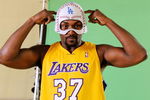 EL SEGUNDO, CA - SEPTEMBER 29: Ron Artest #37 of the Los Angeles Lakers hwears a mask while taping a public announcement for the Los Angeles Dodgers during Lakers media day at the Lakers training facility on September 29, 2009 in El Segundo, California. NOTE TO USER: User expressly acknowledges and agrees that, by downloading and/or using this Photograph, user is consenting to the terms and conditions of the Getty Images License Agreement.  (Photo by Kevork Djansezian/Getty Images)