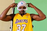 EL SEGUNDO, CA - SEPTEMBER 29: Ron Artest #37 of the Los Angeles Lakers hwears a mask while taping a public announcement for the Los Angeles Dodgers during Lakers media day at the Lakers training facility on September 29, 2009 in El Segundo, California. NOTE TO USER: User expressly acknowledges and agrees that, by downloading and/or using this Photograph, user is consenting to the terms and conditions of the Getty Images License Agreement.  (Photo by Kevork Djansezian/Getty Images)