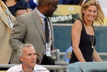 LOS ANGELES, CA - OCTOBER 15:  Owner Frank McCourt and wife Jamie McCourt of the Los Angeles Dodgers take their seats during Game One of the NLCS agianst the Philadelphia Phillies during the 2009 MLB Playoffs at Dodger Stadium on October 15, 2009 in Los Angeles, California.  (Photo by Kevork Djansezian/Getty Images)