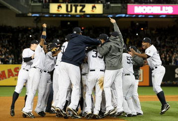 NEW YORK - OCTOBER 25:  The New York Yankees celebrate their 5-2 victory over the Los Angeles Angels of Anaheim at the end of the top of the ninth inning in Game Six of the ALCS during the 2009 MLB Playoffs at Yankee Stadium on October 25, 2009 in the Bronx borough of New York City. The New York Yankees won the ALCS series 4-2 over the Los Angeles Angels of Anaheim.  (Photo by Nick Laham/Getty Images)