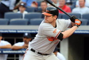 NEW YORK - JULY 20:  Aubrey Huff #17 of the Baltimore Orioles bats against the New York Yankees on July 20, 2009 at Yankee Stadium in the Bronx borough of New York City.  (Photo by Jim McIsaac/Getty Images)