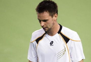SHANGHAI, CHINA - OCTOBER 16:  Robin Soderling of Sweden reacts to a lost point against Feliciano Lopez of Spain during day six of 2009 Shanghai ATP Masters 1000 at Qi Zhong Tennis Centre on October 16, 2009 in Shanghai, China.  (Photo by Victor Fraile/Getty Images)