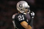 OAKLAND, CA - SEPTEMBER 8:  Nnamdi Asamugha #21 of the Oakland Raiders lines up in position during the NFL game against the Denver Broncos on September 8, 2008 at McAfee Coliseum in Oakland, California. The Broncos defeated the Raiders 41-14. (Photo by Jed Jacobsohn/Getty Images)