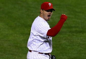 PHILADELPHIA - OCTOBER 18:  Cliff Lee #34 of the Philadelphia Phillies reacts to a strike out against the Los Angeles Dodgers during Game Three of the NLCS during the 2009 MLB Playoffs at Citizens Bank Park on October 18, 2009 in Philadelphia, Pennsylvania.  (Photo by Chris McGrath/Getty Images)