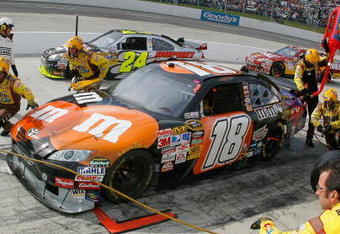 MARTINSVILLE, VA - OCTOBER 25:  Kyle Busch, driver of the #18 M&M's/Halloween Toyota, pits during the NASCAR Sprint Cup Series TUMS Fast Relief 500 at Martinsville Speedway on October 25, 2009 in Martinsville, Virginia.  (Photo by Jason Smith/Getty Images for NASCAR)