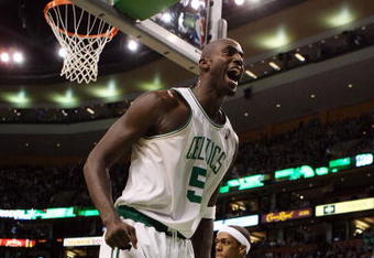 BOSTON - FEBRUARY 08:  Kevin Garnett #5 of the Boston Celtics celebrates a shot against the San Antonio Spurs on February 8, 2009 at TD Banknorth Garden in Boston, Massachusetts. The Spurs defeated the Celtics 105-99. NOTE TO USER: User expressly acknowledges and agrees that, by downloading and or using this Photograph, user is consenting to the terms and conditions of the Getty Images License Agreement.  (Photo by Elsa/Getty Images)