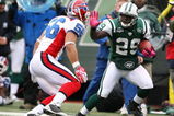 EAST RUTHERFORD, NJ - OCTOBER 18:  Leon Washington of The New York Jets runs against Keith Elison #56 of The Buffalo Bills during their game on October 18, 2009 at Giants Stadium in East Rutherford, New Jersey.  (Photo by Al Bello/Getty Images)