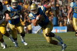 PASADENA, CA - OCTOBER 17:  Quarterback Kevin Prince #14 of the UCLA Bruins runs with the ball against the California Golden Bears on October 17, 2009 at the Rose Bowl in Pasadena, California.   Cal won 45-26.  (Photo by Stephen Dunn/Getty Images)