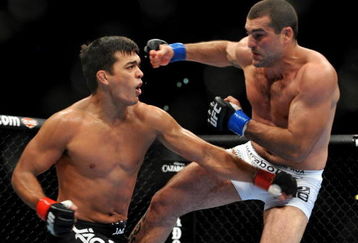 LOS ANGELES, CA - OCTOBER 24:  UFC Light Heavyweight Champion Lyoto Machida (R) battles with UFC Light Heavyweight challenger Mauricio Rua (L) during their title fight at UFC 104 at Staples Center on October 24, 2009 in Los Angeles, California.  (Photo by Jon Kopaloff/Getty Images)