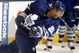 TORONTO - SEPTEMBER 22:  Francois Beauchemin #22 of the Toronto Maple Leafs shoots during warmup before playing the Pittsburgh Penguins during a pre-season  NHL game at the Air Canada Centre on September 22, 2009 in Toronto, Ontario, Canada .  (Photo by Abelimages/Getty Images) 