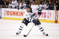 BOSTON - MARCH 17: Bobby Butler #12 of the New Hampshire Wildcats handles the puck during the Hockey East Tournament on March 17,2007 at TD Banknorth Garden in Boston, Massachusetts. Boston College defeated New Hampshire 5-2 to win the Hockey East championship game. (Photo by Elsa/Getty Images)
