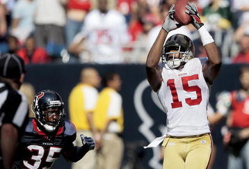 HOUSTON - OCTOBER 25:  Wide receiver Michael Crabtree #15 of the San Francisco 49ers catches a pass in the fourth quarter in front of cornerback Jacque Reeves #35 of the Houston Texans at Reliant Stadium on October 25, 2009 in Houston, Texas.  (Photo by Bob Levey/Getty Images)