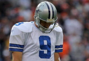 DENVER - OCTOBER 04:  Quarterback Tony Romo #9 of the Dallas Cowboys walks to the bench after failing to convert a third down against the Denver Broncos during NFL action at Invesco Field at Mile High on October 4, 2009 in Denver, Colorado. The Broncos defeated the Cowboys 17-10.  (Photo by Doug Pensinger/Getty Images)