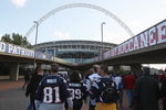LONDON, ENGLAND - OCTOBER 25:  Fans make their way to the stadium prior to the NFL International Series match between New England Patriots and Tampa Bay Buccaneers at Wembley Stadium on October 25, 2009 in London, England. This is the third occasion where a regular season NFL match has been played in London.  (Photo by Elsa/Getty Images)