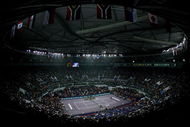 SHANGHAI, CHINA - NOVEMBER 16:  A general view as Novak Djokovic of Serbia serves to Nikolay Davydenko of Russia during the finals of the Tennis Masters Cup at Qi Zhong Stadium November 16, 2008 in Shanghai, China.  (Photo by Matthew Stockman/Getty Images)