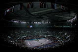 SHANGHAI, CHINA - NOVEMBER 16:  A general view as Novak Djokovic of Serbia serves to Nikolay Davydenko of Russia during the finals of the Tennis Masters Cup at Qi Zhong Stadium November 16, 2008 in Shanghai, China.  (Photo by Matthew Stockman/Getty Images)