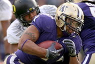 SEATTLE - OCTOBER 24:  Running back Chris Polk #1 of the Washington Huskies rushes against the Oregon Ducks on October 24, 2009 at Husky Stadium in Seattle, Washington. The Ducks defeated the Huskies 43-19. (Photo by Otto Greule Jr/Getty Images)