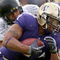SEATTLE - OCTOBER 24:  Running back Chris Polk #1 of the Washington Huskies rushes against the Oregon Ducks on October 24, 2009 at Husky Stadium in Seattle, Washington. The Ducks defeated the Huskies 43-19. (Photo by Otto Greule Jr/Getty Images)