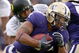 SEATTLE - OCTOBER 24:  Running back Chris Polk #1 of the Washington Huskies rushes against the Oregon Ducks on October 24, 2009 at Husky Stadium in Seattle, Washington. The Ducks defeated the Huskies 43-19. (Photo by Otto Greule Jr/Getty Images)