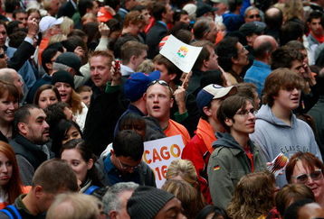 CHICAGO - OCTOBER 02:  Crowds are stunned and disappointed as they learn Chicago was eliminated in the first round of votes during the 2016 Summer Olympic rally and announcement at Daley Plaza on October 2, 2009 in Chicago, Illinois. Chicago hoped to be selected over the other three finalists Madrid, Tokyo and Rio de Janeiro but was the first city eliminated.  (Photo by Scott Olson/Getty Images)