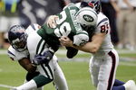 HOUSTON - SEPTEMBER 13: Leon Washington #29 of the New York Jets is tackled by Joel Dreesen #85 of the Houston Texans and Antwaun Molden #28 on a punt return at Reliant Stadium on September 13, 2009 in Houston, Texas.  (Photo by Bob Levey/Getty Images)