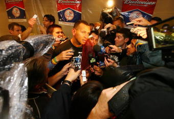NEW YORK - OCTOBER 25:  Alex Rodriguez #13 of the New York Yankees is interviewed by the media after defeating the Los Angeles Angels of Anaheim 5-2 in Game Six of the ALCS during the 2009 MLB Playoffs at Yankee Stadium on October 25, 2009 in the Bronx borough of New York City. The New York Yankees won the ALCS series 4-2 over the Los Angeles Angels of Anaheim to capture the American League pennant.  (Photo by Al Bello/Getty Images)