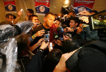 NEW YORK - OCTOBER 25:  Alex Rodriguez #13 of the New York Yankees is interviewed by the media after defeating the Los Angeles Angels of Anaheim 5-2 in Game Six of the ALCS during the 2009 MLB Playoffs at Yankee Stadium on October 25, 2009 in the Bronx borough of New York City. The New York Yankees won the ALCS series 4-2 over the Los Angeles Angels of Anaheim to capture the American League pennant.  (Photo by Al Bello/Getty Images)