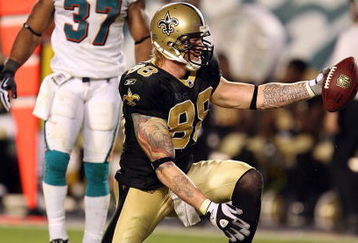 MIAMI - OCTOBER 25:  Tight end Jeremy Shockey #88 of the New Orleans Saints celebrates after making a first down reception over safety Yeremiah Bell #37 of the Miami Dolphins at Land Shark Stadium on October 25, 2009 in Miami, Florida. The Saints defeated the Dolphins 46-34.  (Photo by Doug Benc/Getty Images)