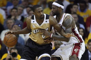 CLEVELAND - APRIL 21:  Gilbert Arenas #0 of the Washington Wizards tries to get around LeBron James #23 of the Cleveland Cavaliers in Game Two of the Eastern Conference Quarterfinals during the 2008 NBA Playoffs at Quicken Loans Arena April 21, 2008 in Cleveland, Ohio.  NOTE TO USER: User expressly acknowledges and agrees that, by downloading and or using this photograph, User is consenting to the terms and conditions of the Getty Images License Agreement.  (Photo by Gregory Shamus/Getty Images)