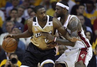 CLEVELAND - APRIL 21:  Gilbert Arenas #0 of the Washington Wizards tries to get around LeBron James #23 of the Cleveland Cavaliers in Game Two of the Eastern Conference Quarterfinals during the 2008 NBA Playoffs at Quicken Loans Arena April 21, 2008 in Cleveland, Ohio.  NOTE TO USER: User expressly acknowledges and agrees that, by downloading and or using this photograph, User is consenting to the terms and conditions of the Getty Images License Agreement.  (Photo by Gregory Shamus/Getty Images)